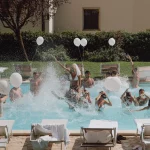 Image of pool party at wedding venue San Pietro sopra le Acque, Italy