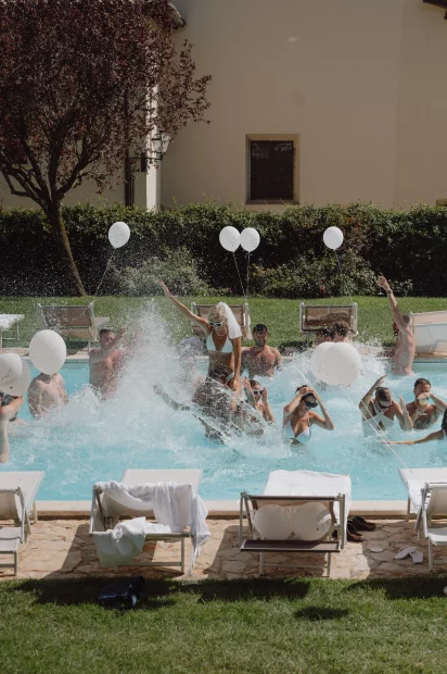 Image of pool party at wedding venue San Pietro sopra le Acque, Italy