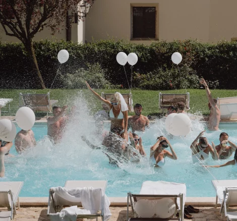 Image of pool party at wedding venue San Pietro sopra le Acque, Italy