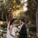 Image of couple standing at the end of the aisle at wedding venue Finca es Convent, Mallorca