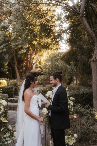 Image of couple standing at the end of the aisle at wedding venue Finca es Convent, Mallorca