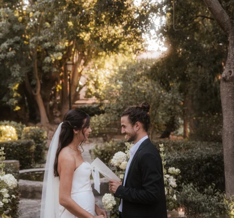 Image of couple standing at the end of the aisle at wedding venue Finca es Convent, Mallorca