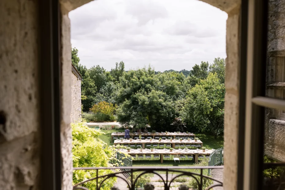 Image of tables taken on a balcony at wedding venue Chateau de Puissentut, France