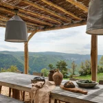 Image of table outside with views at wedding venue Almières Retreat