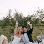 Image of married couple sat at dinner table at wedding venue Finca La Concertista, Spain