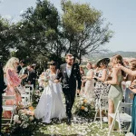 Image of married couple walking down aisle at wedding venue Hacienda Sambana