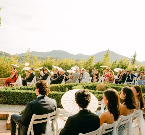 Guests sat on wedding aisle at wedding venue Mas de Sant Lleí, Barcelona