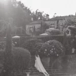 Image of couple walking up stairs to wedding venue The Fox House, Portugal