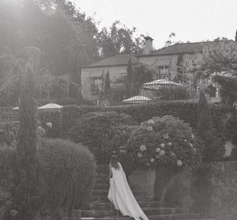Image of couple walking up stairs to wedding venue The Fox House, Portugal