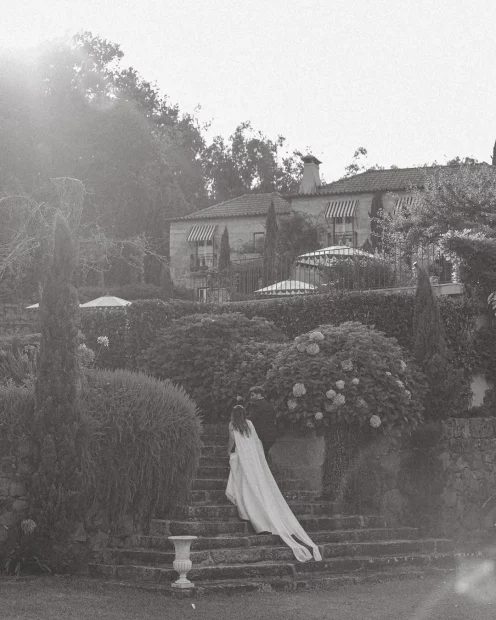 Image of couple walking up stairs to wedding venue The Fox House, Portugal