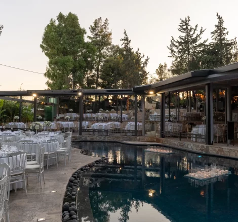 Image of pool and tables at wedding venue Kleopatra, Greece
