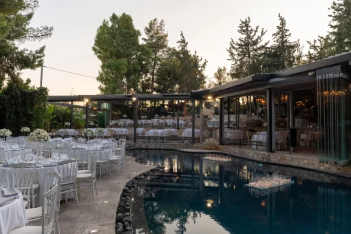Image of pool and tables at wedding venue Kleopatra, Greece