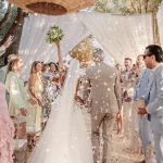 Image of bride and groom walking down aisle after ceremony