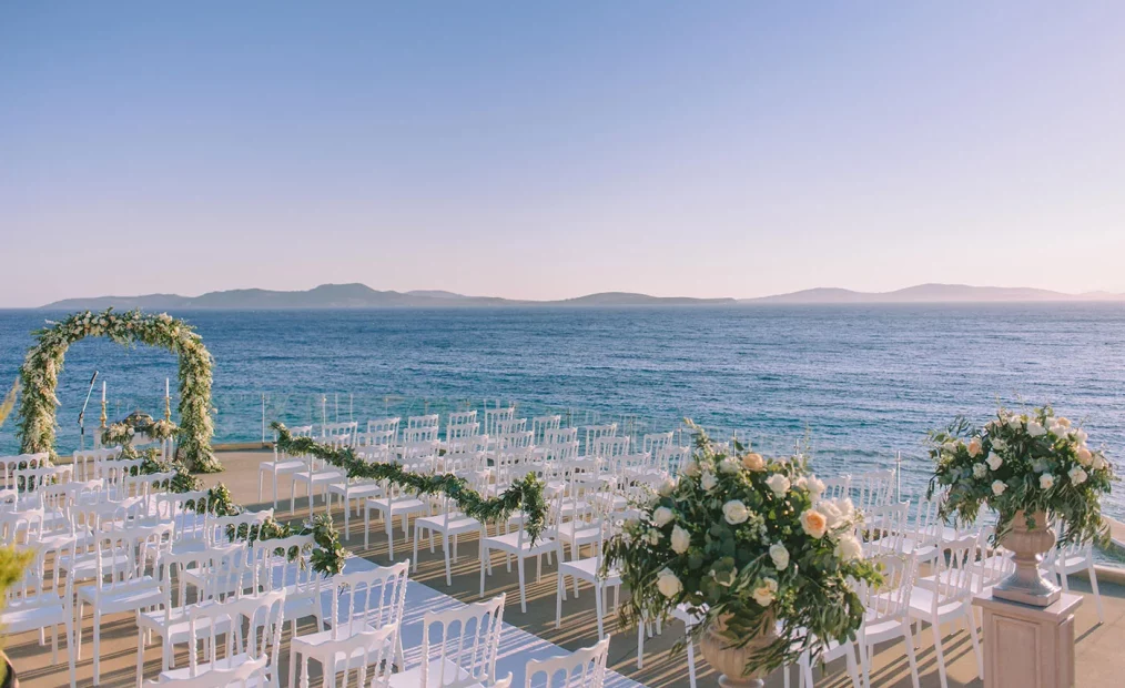 Image of wedding aisle with sea view at wedding venue Saint John Hotel Villas and Spa in Mykonos, Greece