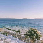 Image of wedding aisle with sea view at wedding venue Saint John Hotel Villas and Spa in Mykonos, Greece