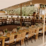 Image of table set up under canopy at wedding venue La Compagnie des Campagnes in Occitanie France