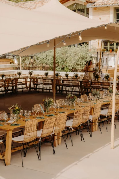 Image of table set up under canopy at wedding venue La Compagnie des Campagnes in Occitanie France