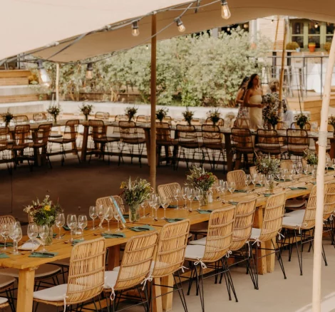 Image of table set up under canopy at wedding venue La Compagnie des Campagnes in Occitanie France