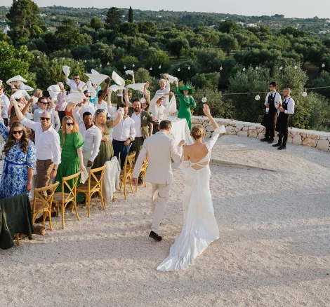 Image of couple walking down aisle at wedding venue Villa Rocca 1914, Italy