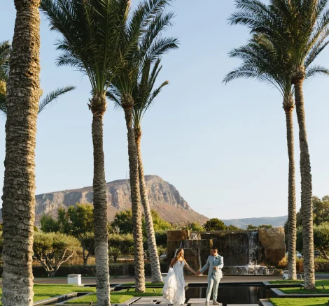 Image of couple with mountain views at wedding venue Amirandes, A Grecotel Resort, Greece