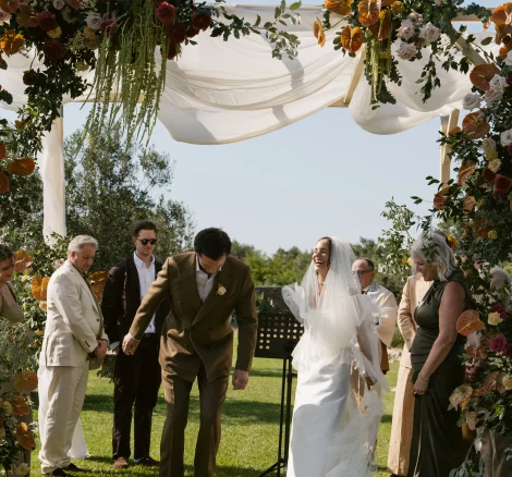 Image of couple at the end of aisle at wedding venue Tenuta Negroamaro, Italy