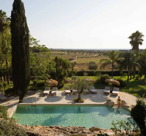 Image of pool and views at wedding venue Tenuta Negroamaro, Italy