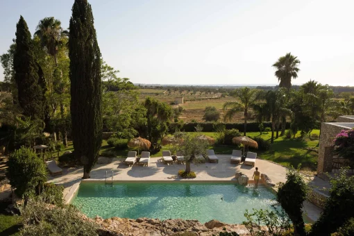 Image of pool and views at wedding venue Tenuta Negroamaro, Italy